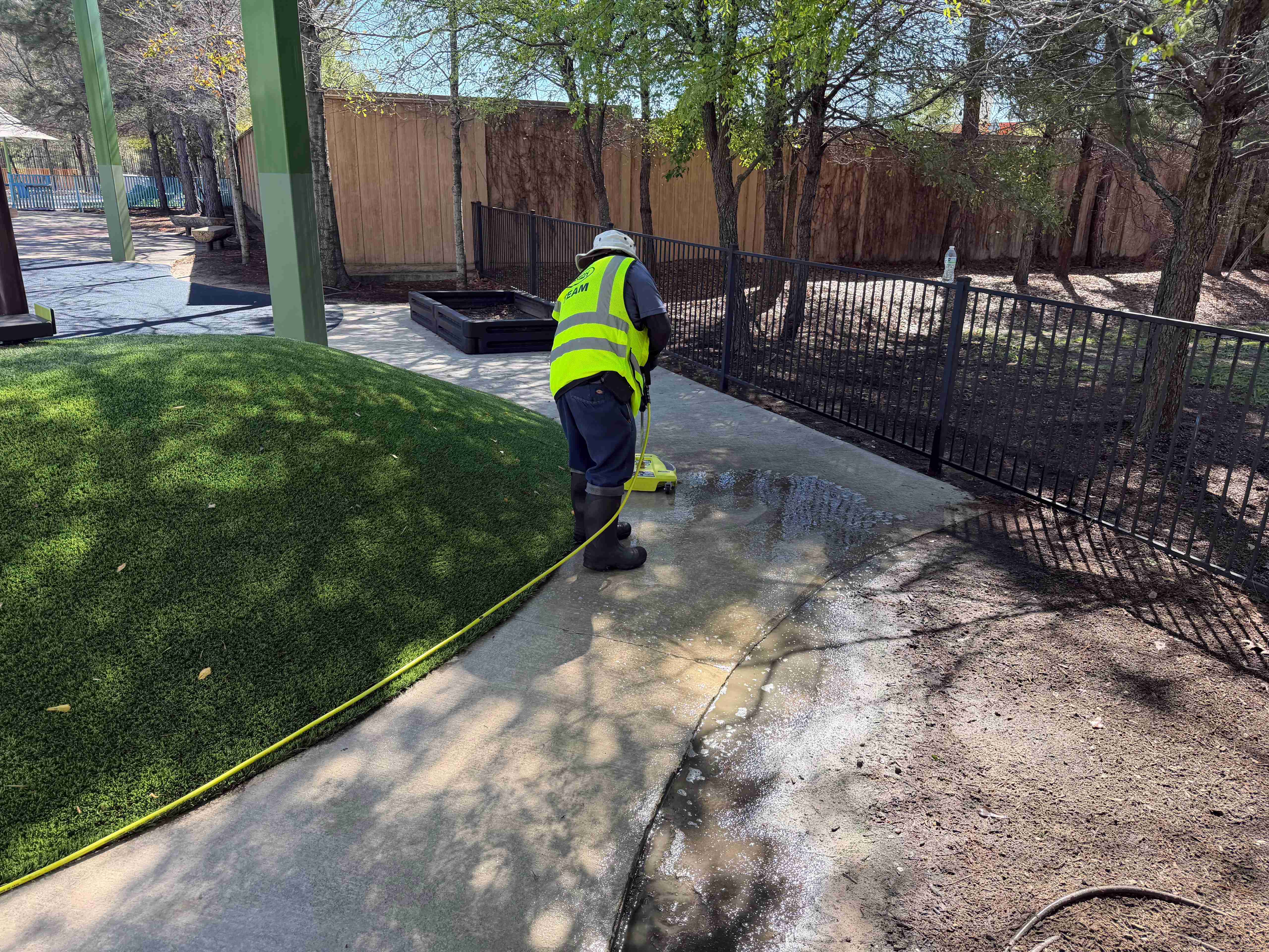 Surface cleaning a walkway at a commercial property
